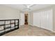 Bedroom with tiled floors, ceiling fan and plenty of closet space at 6964 Glacier Ave, North Port, FL 34291