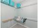 Walk-in closet featuring wire shelving and ample storage space for organizing at 6964 Glacier Ave, North Port, FL 34291