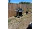 Backyard with stainless steel outdoor grill, great for outdoor cooking at 700 Forest St, Nokomis, FL 34275