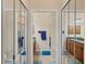 Bathroom showcasing double sinks and a glass shower at 700 Gardens Edge Dr # 722, Venice, FL 34285