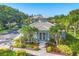Charming clubhouse with well-manicured landscaping and ample parking at 700 Gardens Edge Dr # 722, Venice, FL 34285