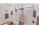 Bathroom featuring a tile shower-tub combo and granite counters at 809 Derbyshire Dr, Venice, FL 34285