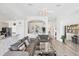 Inviting living room featuring neutral tones, archways, and an open floor plan in The Plantation community, Venice, Florida at 809 Derbyshire Dr, Venice, FL 34285