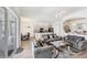 Open concept living area with adjacent kitchen and dining space in The Plantation community, Venice, Florida at 809 Derbyshire Dr, Venice, FL 34285