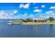 Community center with a dock and boat slip on the lake at 8245 Grande Shores Dr, Sarasota, FL 34240