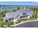 Community center aerial view showcasing the exterior architectural details and landscaping at 8245 Grande Shores Dr, Sarasota, FL 34240