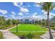 Exterior of community center building with pristine grounds and lawn at 8245 Grande Shores Dr, Sarasota, FL 34240