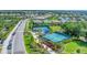 Aerial view of community pickleball courts with landscaping and sidewalks at 8245 Grande Shores Dr, Sarasota, FL 34240