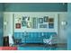 Stylish lounge area with comfortable seating, artwork, and modern decor, creating a welcoming and sophisticated ambiance at 8245 Grande Shores Dr, Sarasota, FL 34240