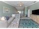 Cozy living room featuring a comfortable sofa, elegant decor, and open layout with natural light at 841 Waterside Dr # 202, Venice, FL 34285