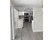 Beautiful kitchen featuring stainless steel appliances, white cabinets, and a kitchen island at 9110 Lunar Ln, Port Richey, FL 34668