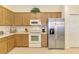 Kitchen features stainless steel appliances and lots of storage space at 9361 Carnaby Dr, Venice, FL 34293