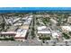 Aerial view of Venice displaying tree-lined streets and diverse commercial buildings in the business district at 950 Tarpon Center Dr # 305, Venice, FL 34285