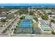Aerial view of tennis courts, basketball courts, and shuffleboard courts at 950 Tarpon Center Dr # 305, Venice, FL 34285