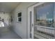 An outdoor balcony seating area for a condominium overlooking beautiful water views at 950 Tarpon Center Dr # 305, Venice, FL 34285
