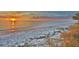 Beautiful beach view during sunset, showing sand and ocean at 950 Tarpon Center Dr # 305, Venice, FL 34285