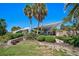 The park entrance features lush landscaping and offers a welcoming atmosphere at 950 Tarpon Center Dr # 305, Venice, FL 34285