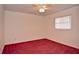 Another bedroom with plush carpeting, ceiling fan, and a window at 1290 Leeward Rd, Venice, FL 34293
