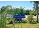 South Venice Beach Ferry sign surrounded by lush greenery, offering easy access to the beach at 1290 Leeward Rd, Venice, FL 34293