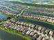 Expansive aerial view of a stunning waterfront community with interconnected lakes and beautiful homes at 13862 Miranese St, Venice, FL 34293