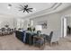 Open concept living space with a cozy seating area and direct access to the dining area at 2396 Caraway Dr, Venice, FL 34292