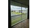 View from balcony overlooking a canal and other homes at 3310 Loveland Blvd # 1406, Punta Gorda, FL 33980