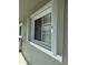 Window with accordion shutters at 3310 Loveland Blvd # 1406, Punta Gorda, FL 33980