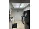 Full view of kitchen, black appliances at 3310 Loveland Blvd # 1406, Punta Gorda, FL 33980