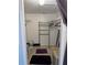 Walk-in closet with shelving and rod for hanging clothes at 3310 Loveland Blvd # 1406, Punta Gorda, FL 33980