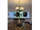 Dining area with kitchen view at 3310 Loveland Blvd # 1406, Punta Gorda, FL 33980
