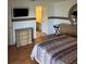 Main bedroom with ensuite bathroom and large dresser at 3310 Loveland Blvd # 1406, Punta Gorda, FL 33980