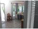 Bright living room with hardwood floors and view to backyard at 18245 Ackerman Ave, Port Charlotte, FL 33948