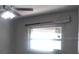 Simple bedroom with window and ceiling fan at 18245 Ackerman Ave, Port Charlotte, FL 33948