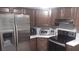 Modern kitchen with stainless steel appliances at 18245 Ackerman Ave, Port Charlotte, FL 33948