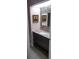 Half bathroom with granite countertop and modern sink at 18245 Ackerman Ave, Port Charlotte, FL 33948