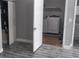 Laundry room with washer, dryer and access to other rooms at 18245 Ackerman Ave, Port Charlotte, FL 33948