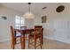 Dining room with wooden table and decorative lighting at 334 7Th N Ave, Tierra Verde, FL 33715