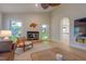 Cozy living room offers unique decor, tile floors, high ceilings, and access to other rooms at 334 7Th N Ave, Tierra Verde, FL 33715