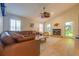 Spacious living room has high ceilings, tile floors, fireplace, ceiling fan and comfortable seating at 334 7Th N Ave, Tierra Verde, FL 33715
