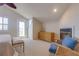 Spacious main bedroom features a balcony, fireplace, large bed, and comfortable furnishings at 334 7Th N Ave, Tierra Verde, FL 33715