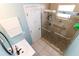 Bathroom featuring a walk-in shower at 7585 Kavanda St, North Port, FL 34287