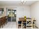 Dining area off the kitchen with sliding glass doors at 7585 Kavanda St, North Port, FL 34287
