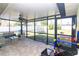 Screened-in patio with outdoor seating at 7585 Kavanda St, North Port, FL 34287
