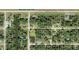Aerial view of properties showing lot lines and neighborhood layout in a residential area at 16029 Arcaro Ave, Port Charlotte, FL 33954