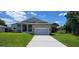 Beautiful two-story craftsman home with a stone facade at 5113 Hablow Ln, North Port, FL 34286