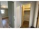 Bedroom leads to walk-in closet at 4250 Shamrock Dr, Venice, FL 34293