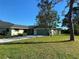 Charming single-story home featuring a well-manicured lawn and inviting curb appeal at 4250 Shamrock Dr, Venice, FL 34293