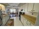 Kitchen view with appliances and dining room in background at 4250 Shamrock Dr, Venice, FL 34293