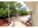 Relaxing patio area with lounge chairs and seating for outdoor relaxation at 1104 S Moonmist Ct # M-10, Sarasota, FL 34242
