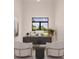 Modern home office with large window and plenty of natural light at 24194 Peppercorn Rd, Punta Gorda, FL 33955